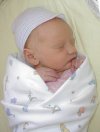 Annabelle in her bassinet.
